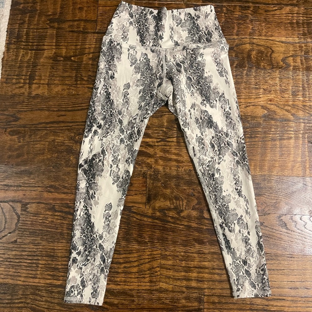 Evolution and Creation Snake Skin pattern leggings